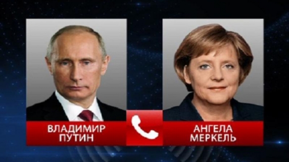 Ряд актуальных международных проблем обсудили по <b>телефон</b>у Владимир Путин и Ангела М...