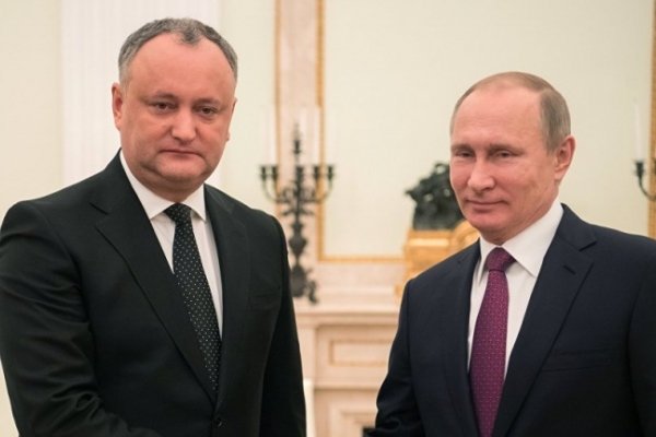 Путин поддержал Додона в его намерении развивать отношения с РФ